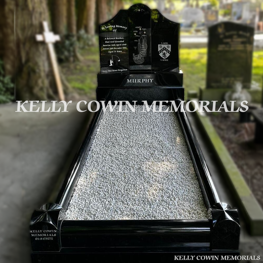 Front view of black granite Gates to Heaven headstone with silver inscription in a Dublin cemetery