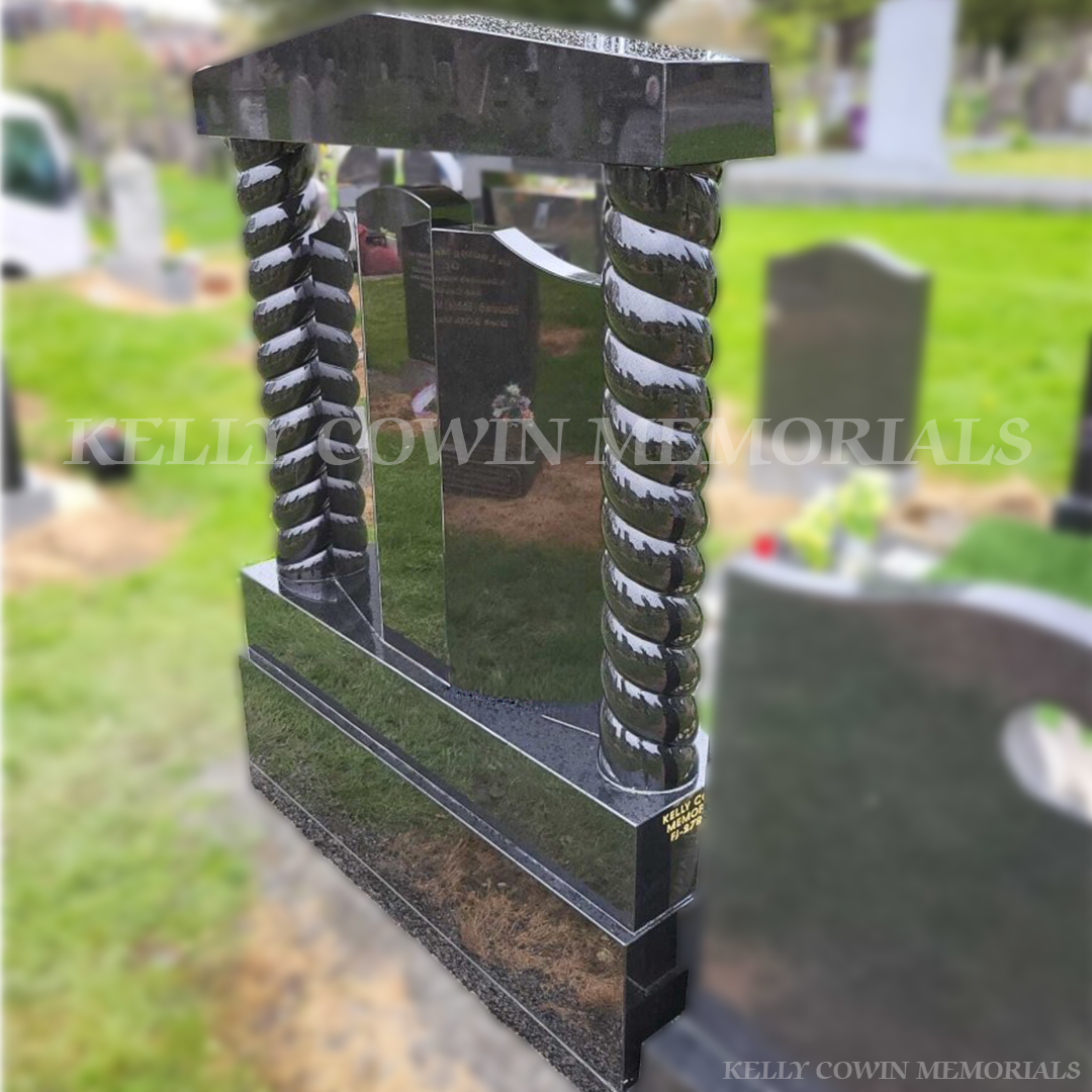Back angle view of Black Granite Gates of Heaven headstone crafted by Kelly Cowin Memorials in Glasnevin