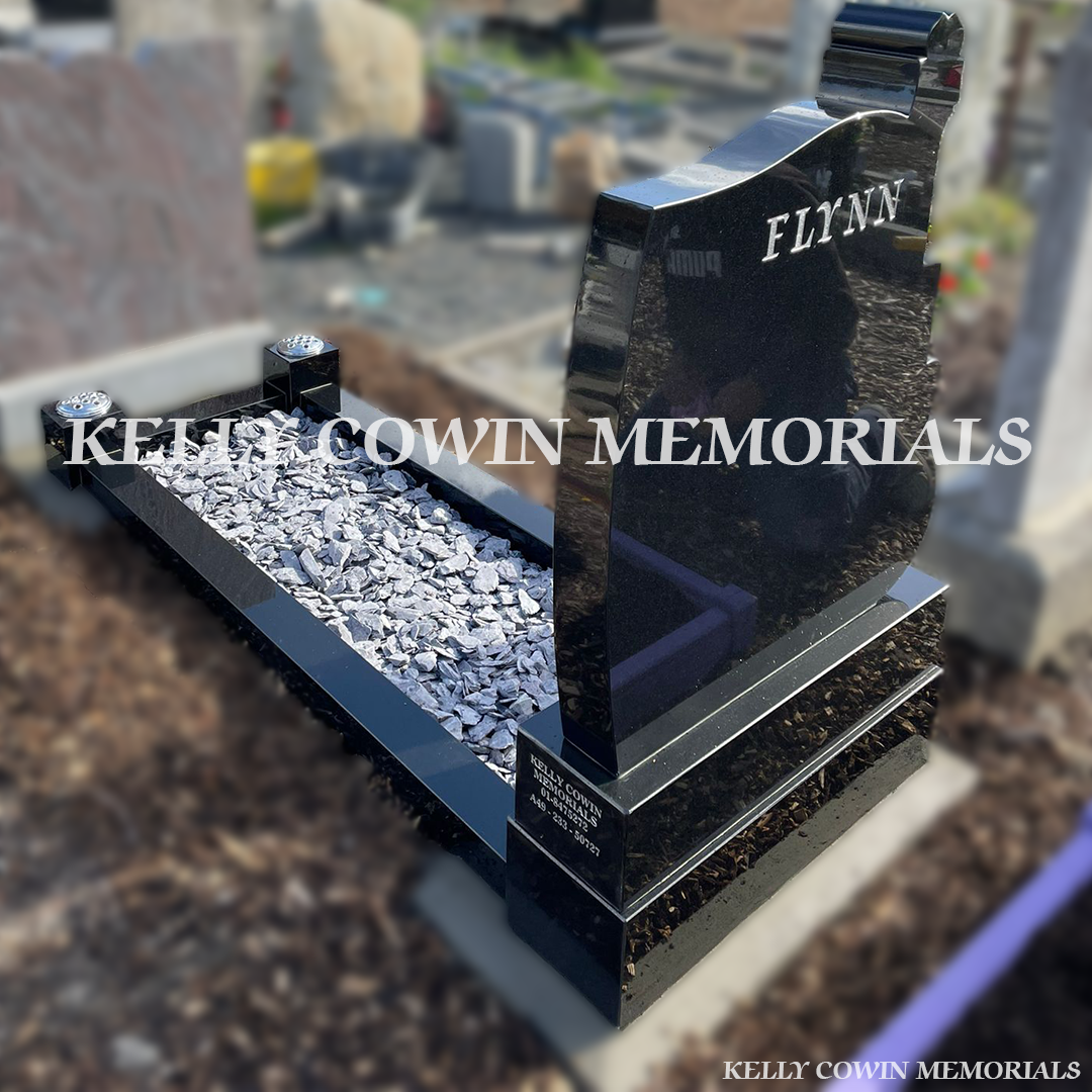 Back view of Black Granite guitar-shaped headstone highlighting craftsmanship by Kelly Cowin Memorials