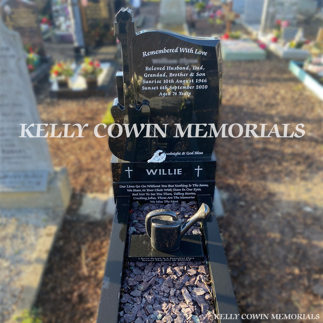 Front view of Black Granite guitar headstone with kerbing and chippings erected in Glasnevin Cemetery by Kelly Cowin Memorials