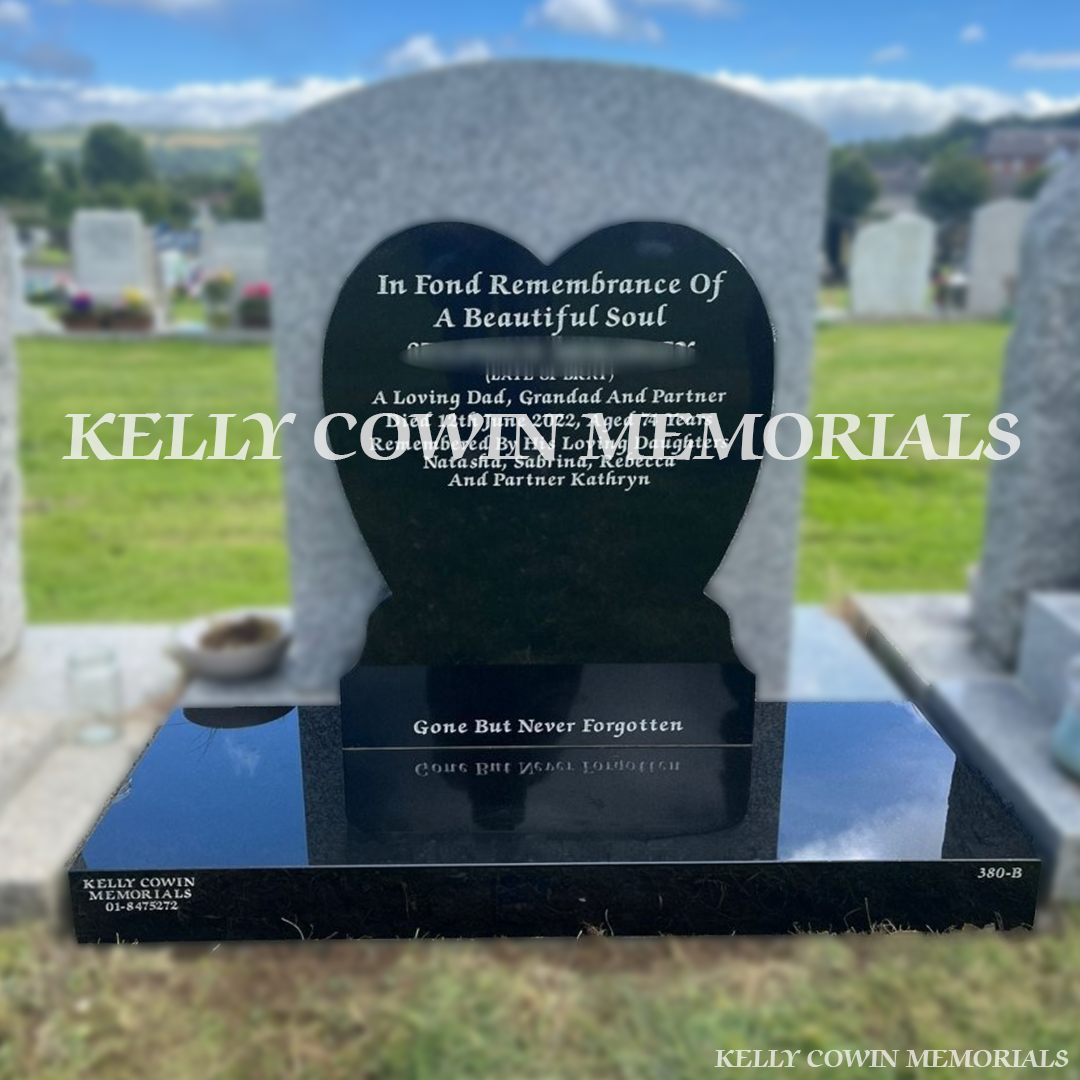 Front view of black granite heart-shaped headstone with white inscription in Springfield Cemetery
