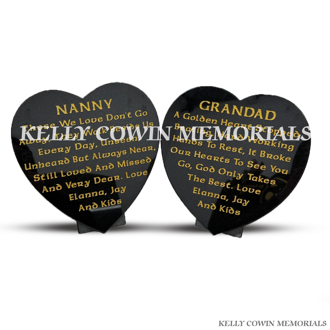 Front view of two black granite heart plaques with gold engraved wording
