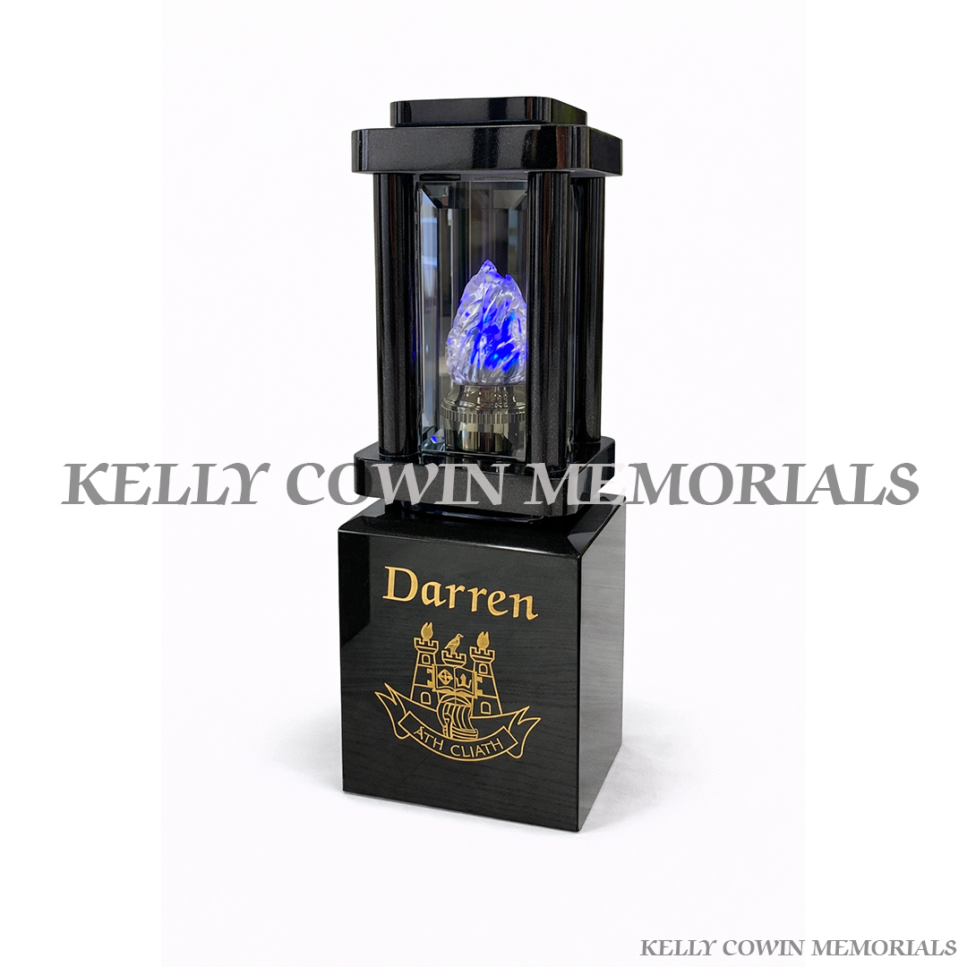 Black granite memorial lantern on engraved block with flame insert grave tribute light Ireland