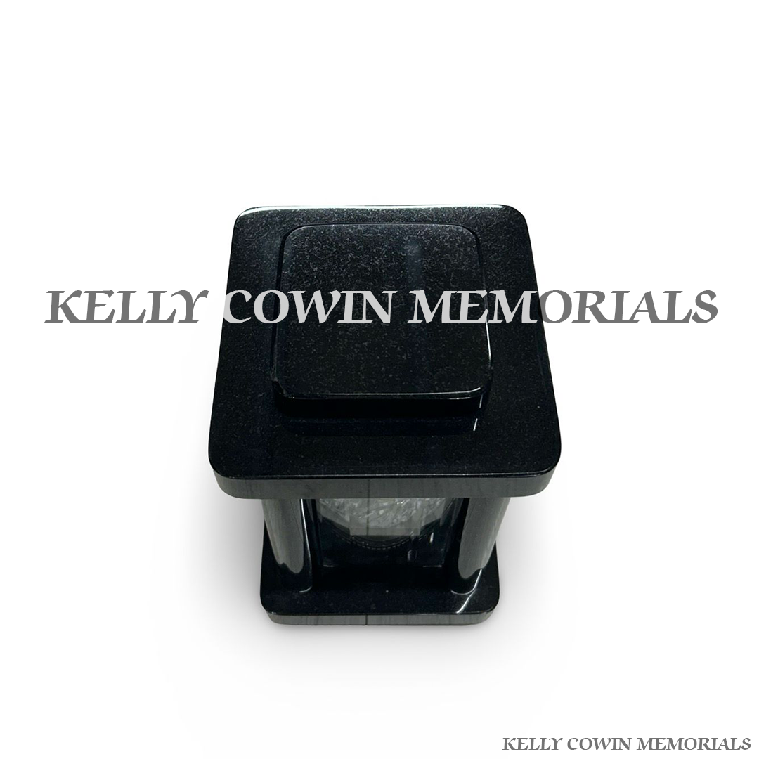 Close-up of black granite polished finish on square lantern