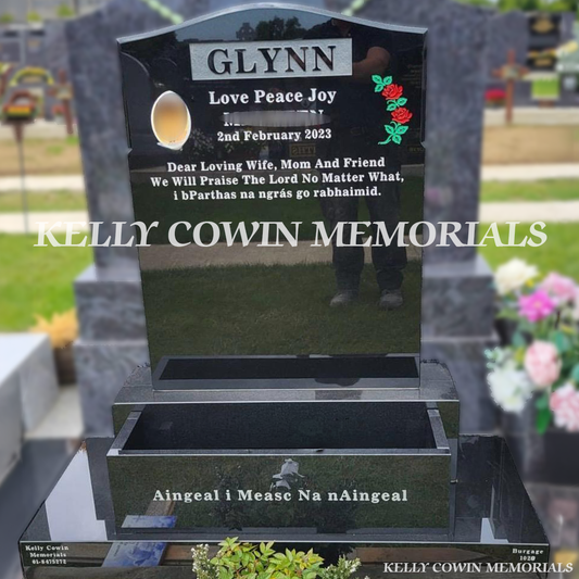 Front view of black granite OG headstone with silver inscription in Balgriffin Cemetery