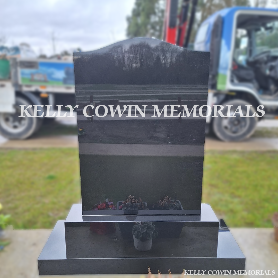 Rear view of black granite OG headstone erected in Balgriffin Cemetery