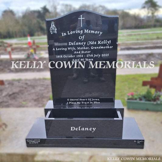 Front view of black granite OG headstone with silver inscription in Balgriffin Cemetery