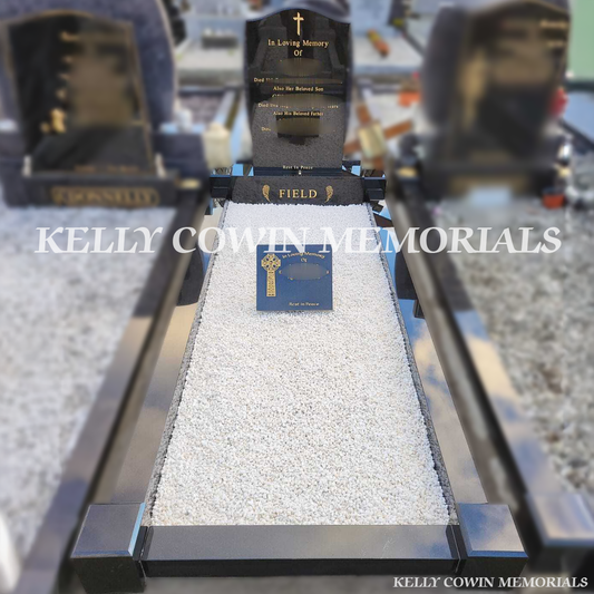 Front view of black granite OG headstone with gold inscription and full kerbing in Fingal Cemetery Dublin