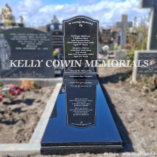 Front view of black granite OG headstone with silver inscription in Glasnevin Cemetery