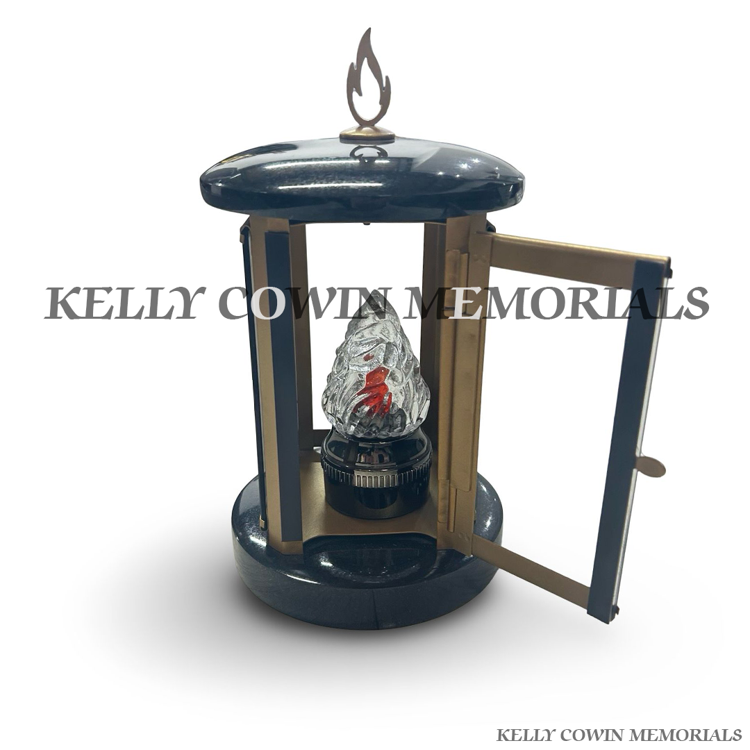 Front view of black granite round lantern with bronze detailing