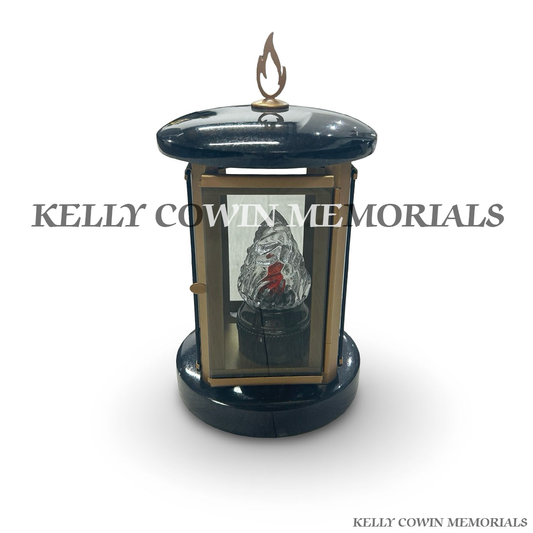 Front view of black granite round lantern with bronze detailing