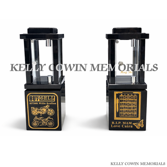 Front view of black granite solar lantern with gold engraved bingo card and butterfly