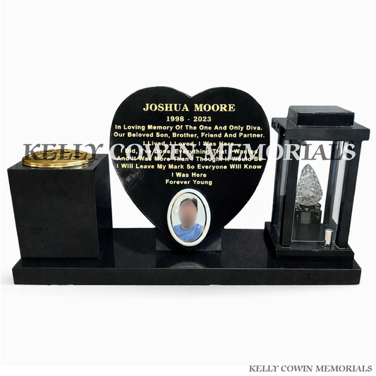 Front view of black granite solar lantern, heart and vase set on polished plinth