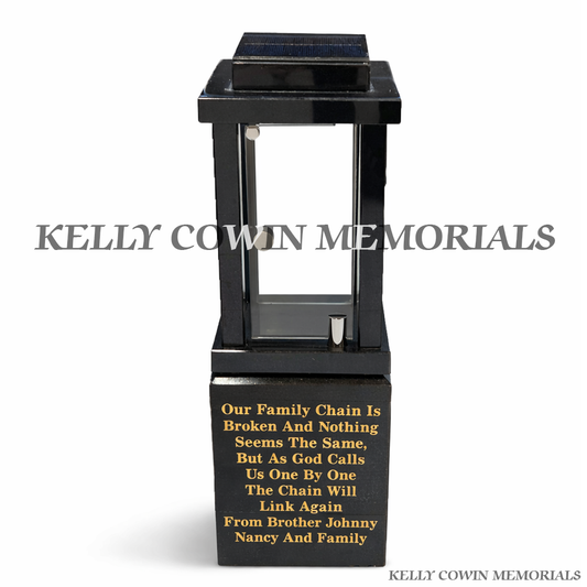 Front view of black granite solar lantern with gold engraved poem