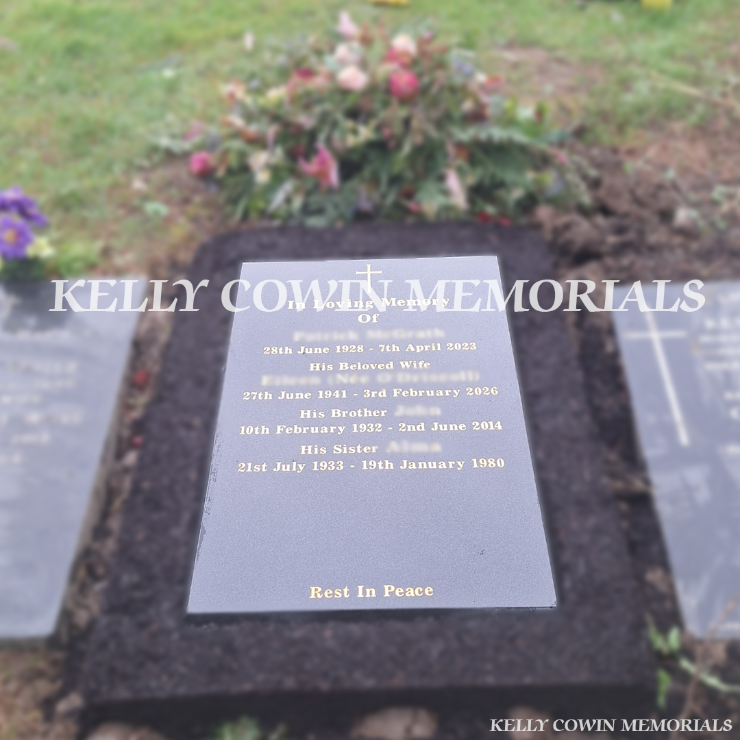 Front view of black granite St. Fintan’s headstone with gold inscription in Sutton