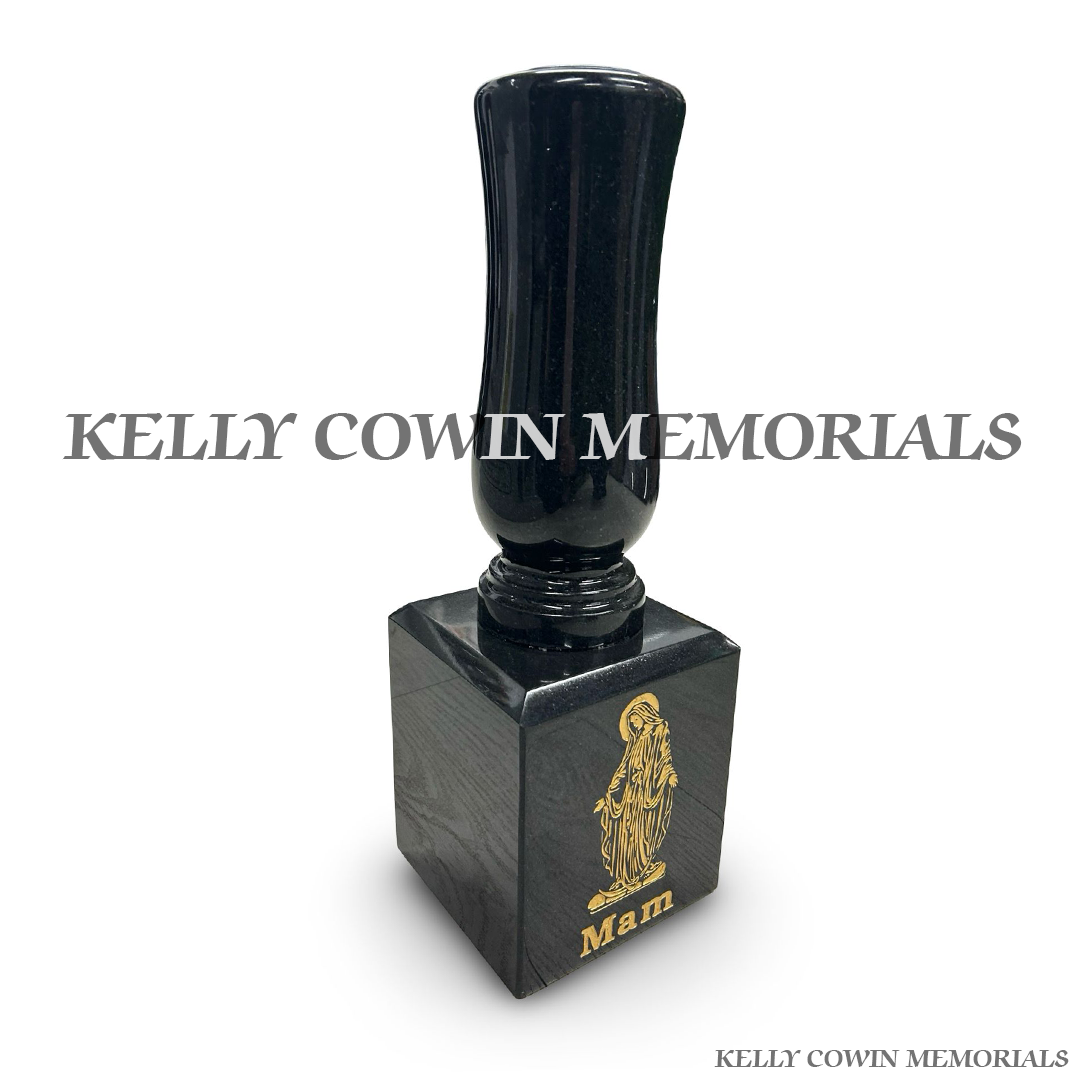 Side view of black granite vase and block memorial with gold detailing