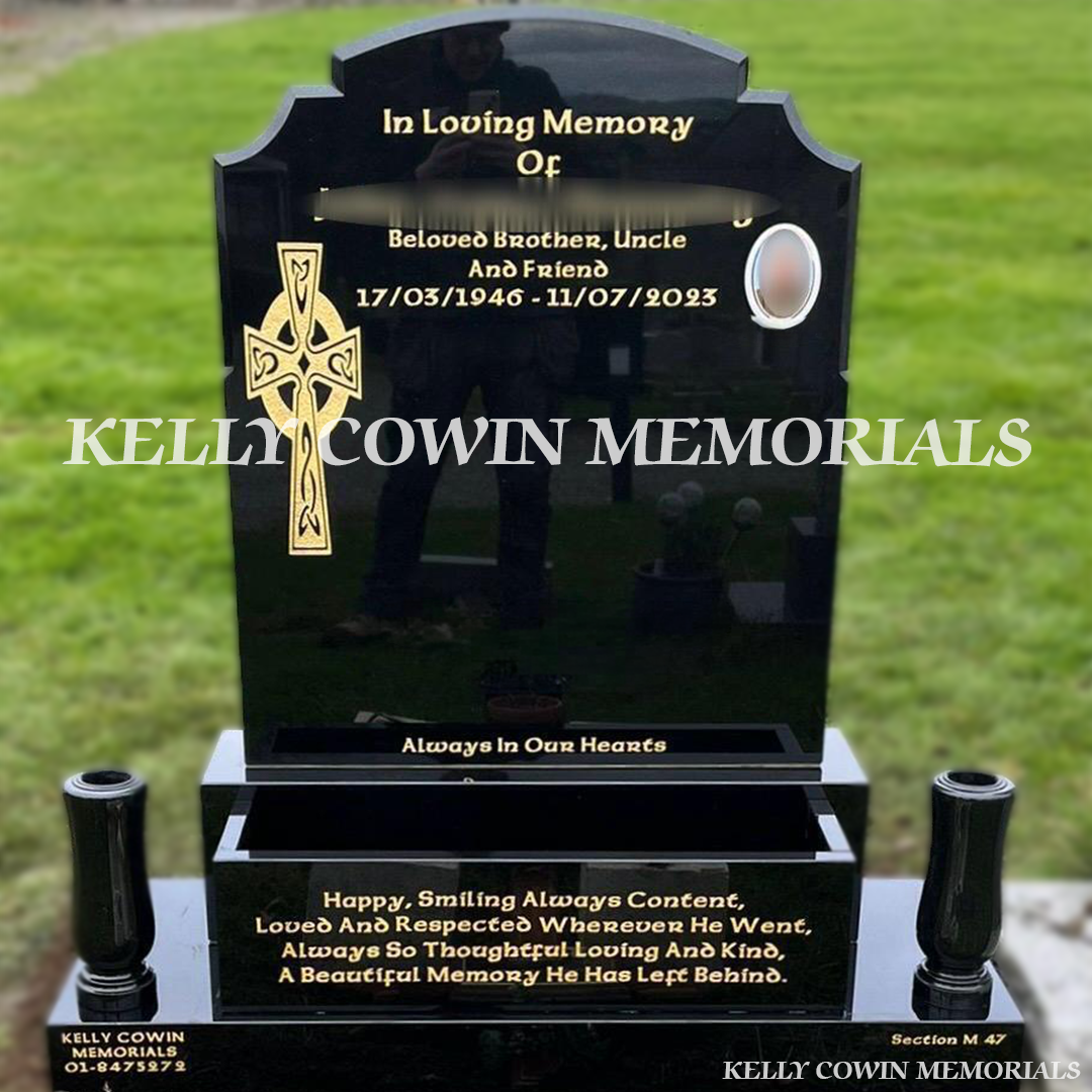 Front view of black granite Top Nine headstone with gold inscription in Glencullen Cemetery