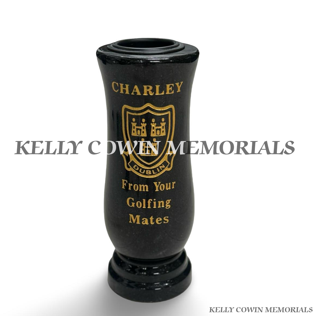 Black polished granite tall memorial flower vase with personalised gold inscription, custom Dublin crest and decorative curved design.