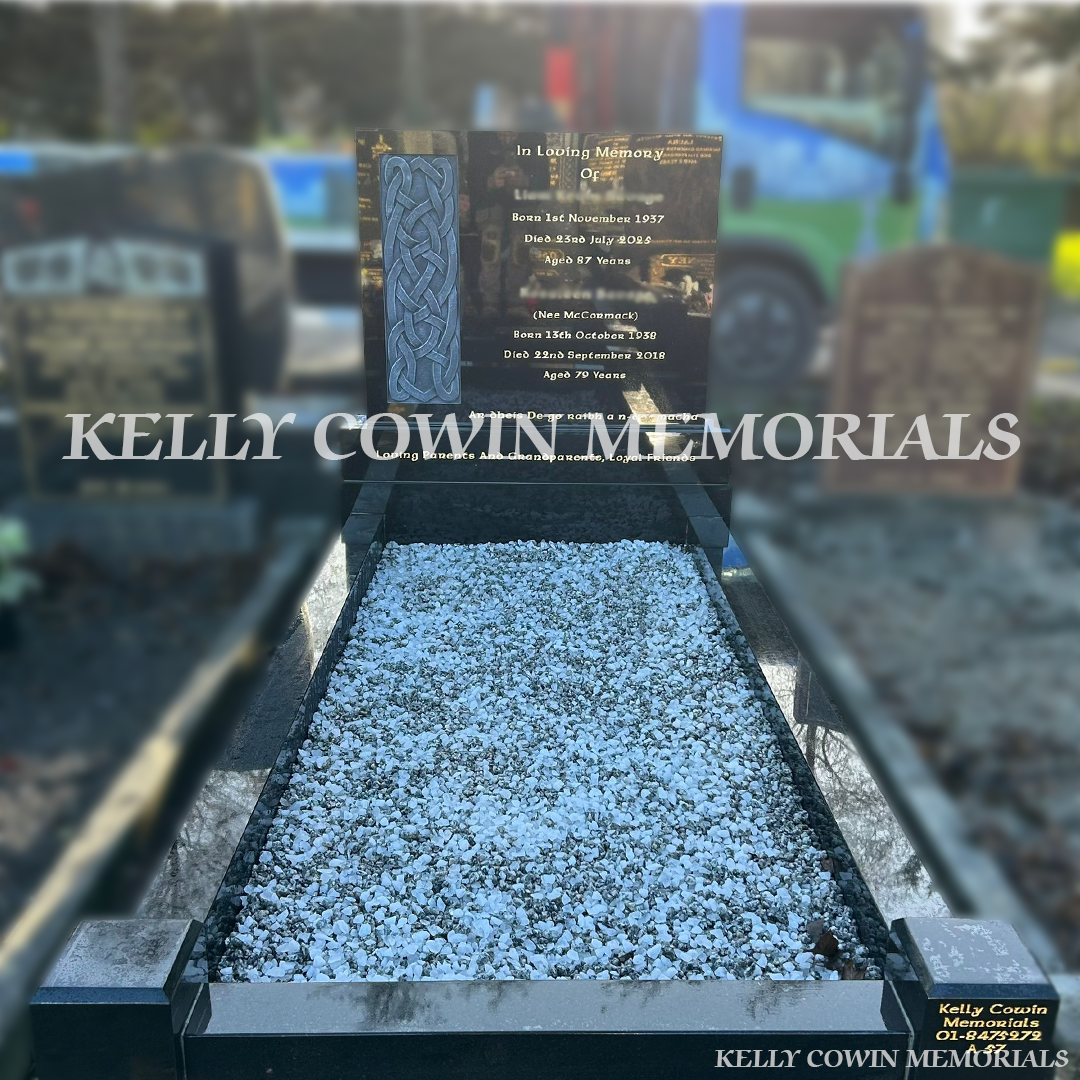 “Black granite rectangular headstone with carved Celtic cross and full kerbing installed in Fingal Cemetery Dublin.”