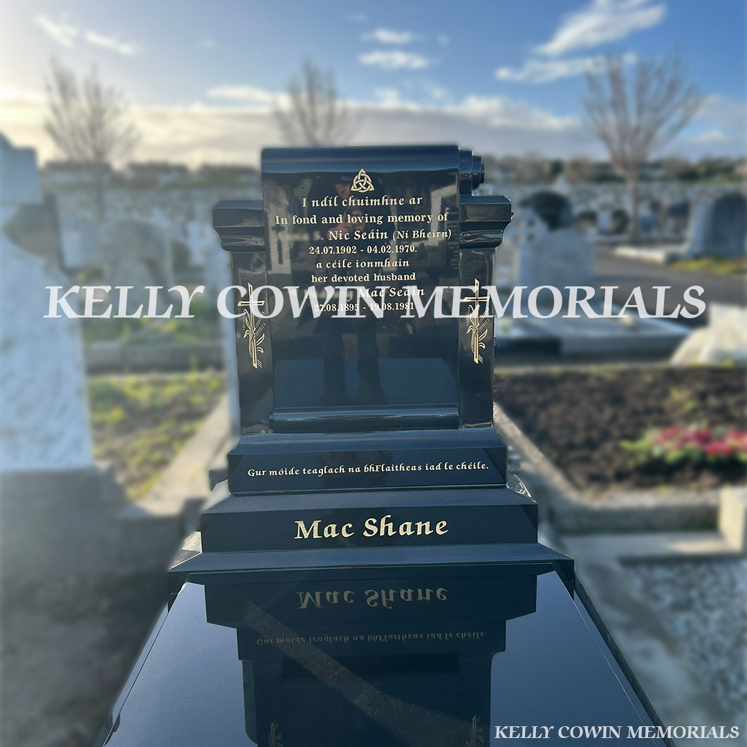 Front close up view of custom Black Granite scroll-shaped headstone with kerbing and covering slab erected in Deansgrange Cemetery Dublin by Kelly Cowin Memorials
