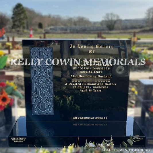 Black granite headstone with antique carved design erected in Balgriffin Cemetery Dublin by Kelly Cowin Memorials