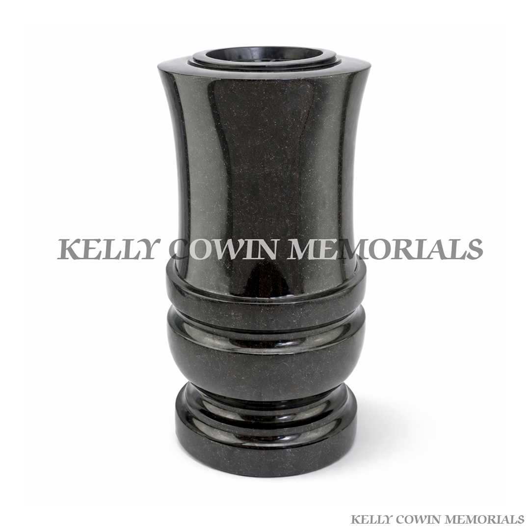 Black granite tall memorial vase with classic curved tapered shape and polished finish for grave flowers Ireland