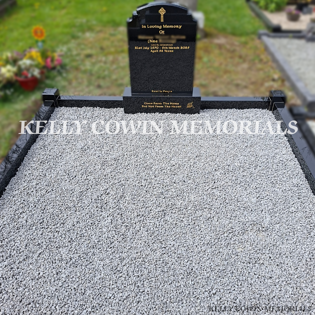 Front view of black granite Top Nine headstone with gold inscription in Moorechurch Cemetery
