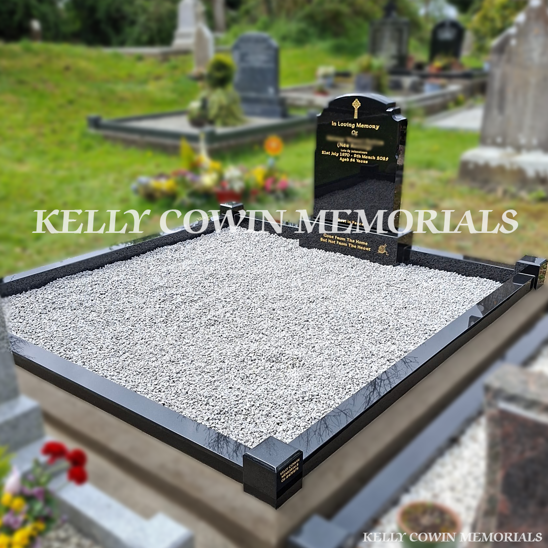 Side view of black granite memorial with kerbing and grey chippings