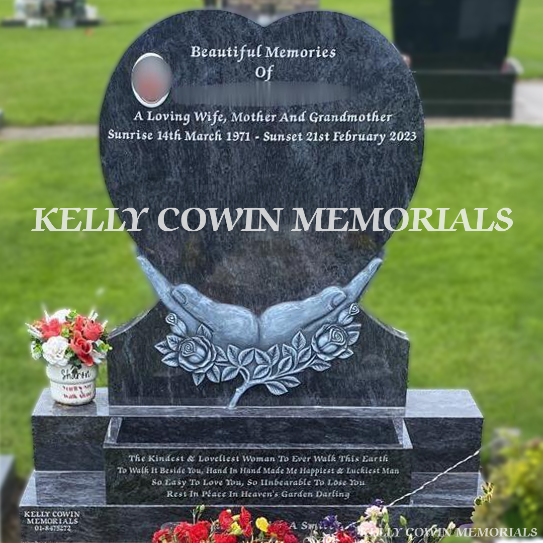 Front view of Blue Lagoon Heart in Hands headstone with silver inscription in Springfield Cemetery