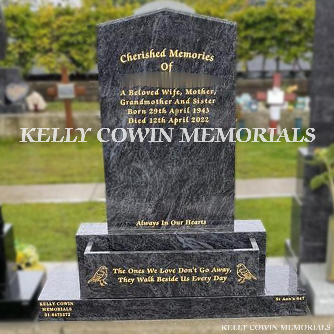 Blue Lagoon Apex headstone with gold inscription on a base and plinth, finished with a flowerbox in Balgriffin Cemetery