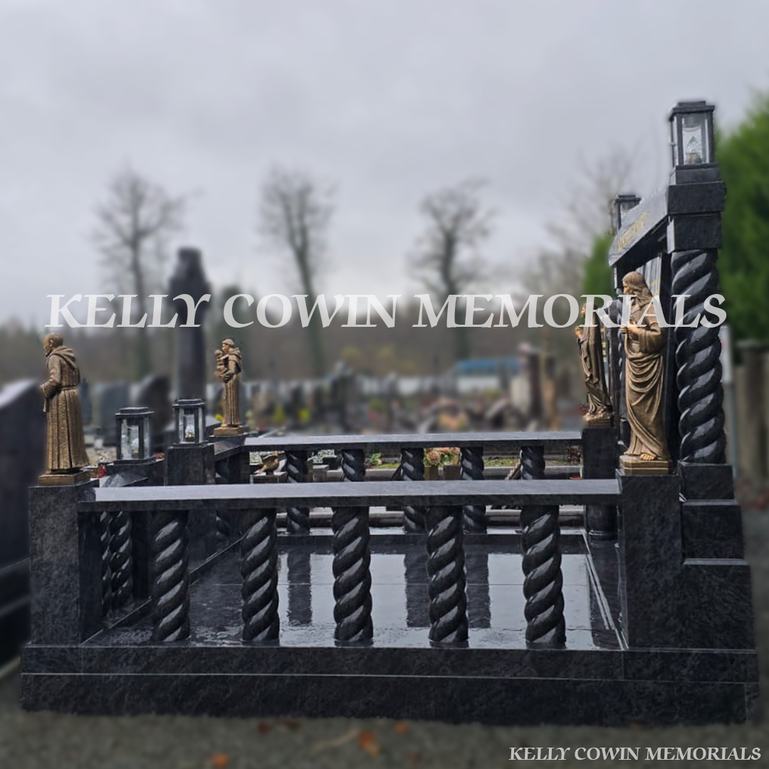 Blue Lagoon granite book headstone with twisted pillars, bronze religious statues and gold leaf inscription in Mount Bellew Cemetery, Galway