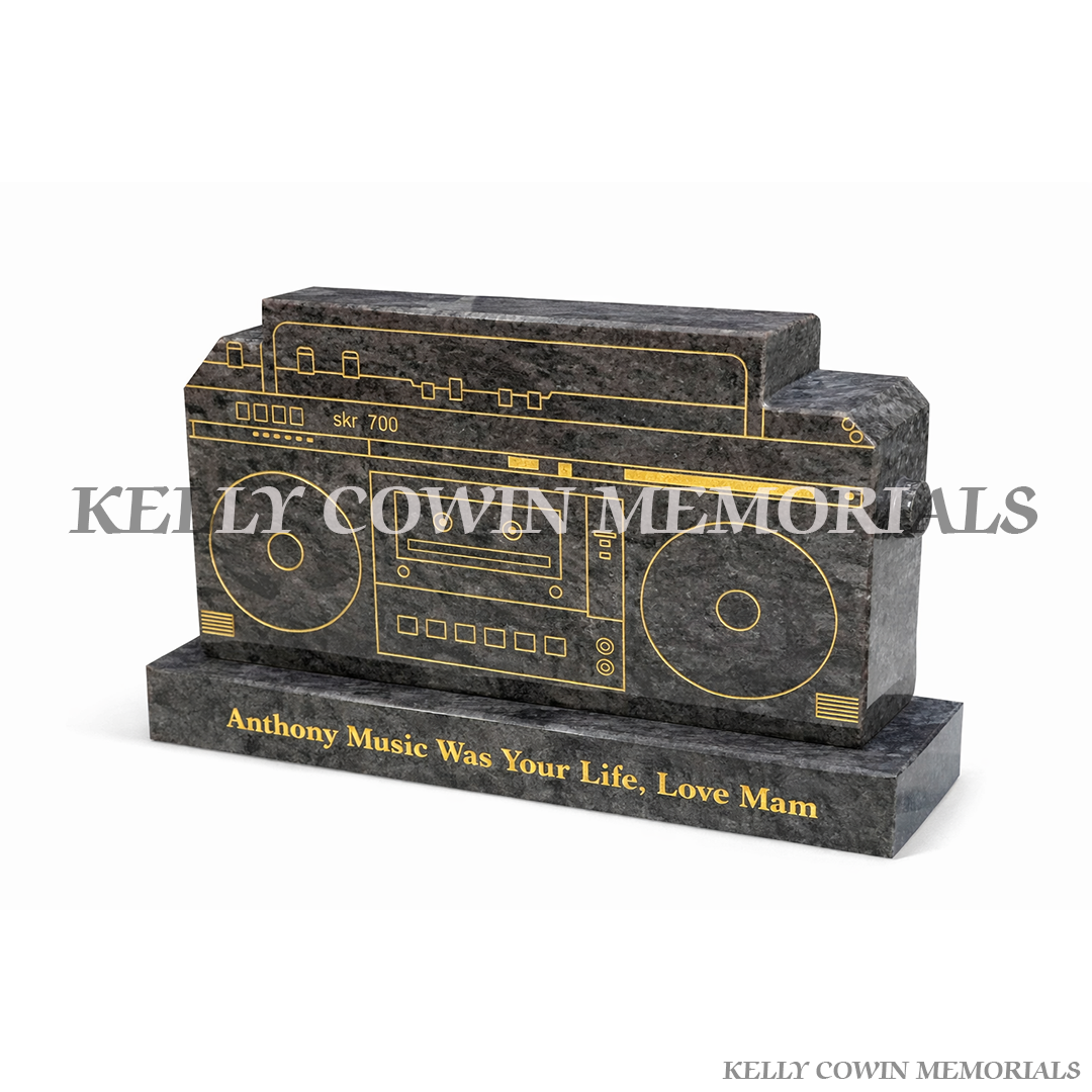 Side View Blue Lagoon granite boom box memorial on plinth with personalised engraved inscription by Kelly Cowin Memorials Ireland