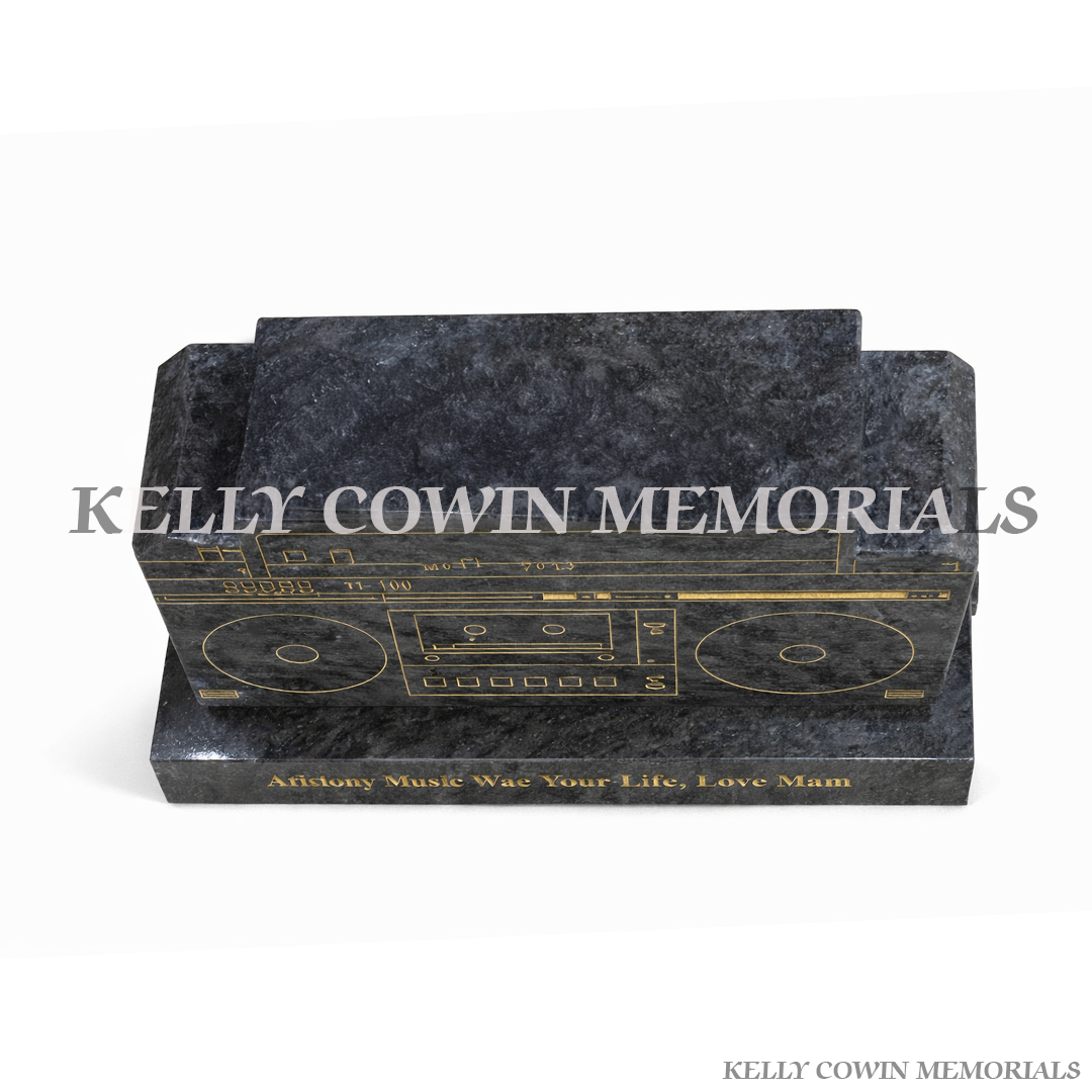 Top view Blue Lagoon granite boom box memorial on plinth with personalised engraved inscription by Kelly Cowin Memorials Ireland