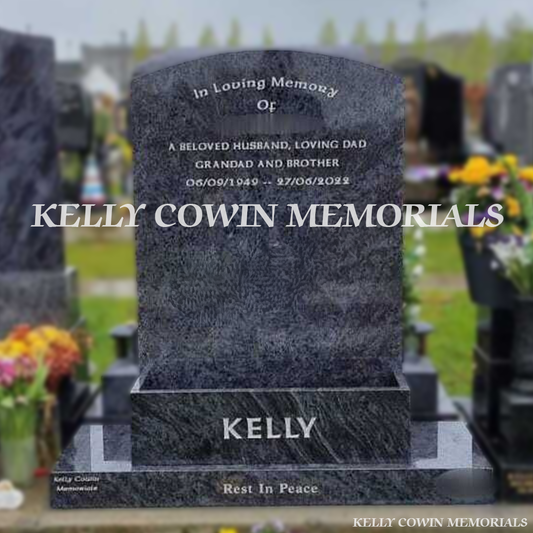 Front view of Blue Lagoon boulder headstone on plinth with flower box in Balgriffin Cemetery Dublin