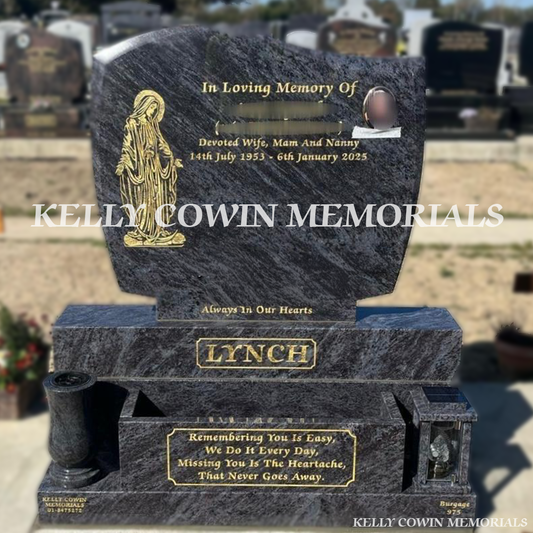 Front view of Blue Lagoon C1 headstone with gold inscription, flower box and oval ceramic photograph in Balgriffin Cemetery Dublin