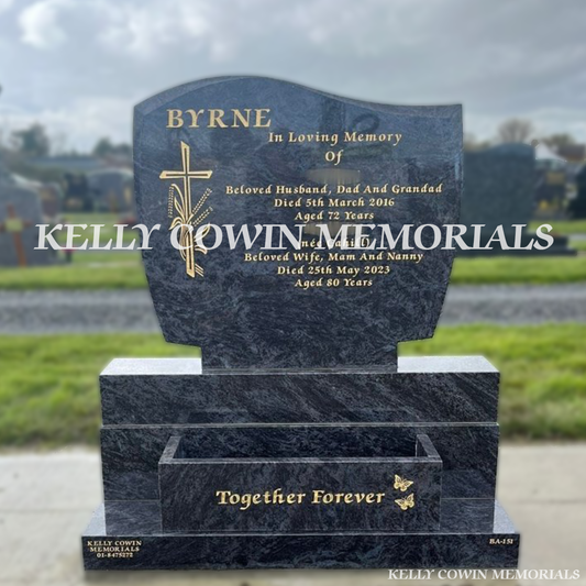 Front view of Blue Lagoon C1 headstone with gold inscription and flower box in Dardistown Cemetery Dublin