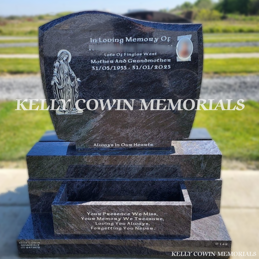 Front view of Blue Lagoon C1 headstone with silver inscription and oval ceramic photograph in Dardistown Cemetery Dublin