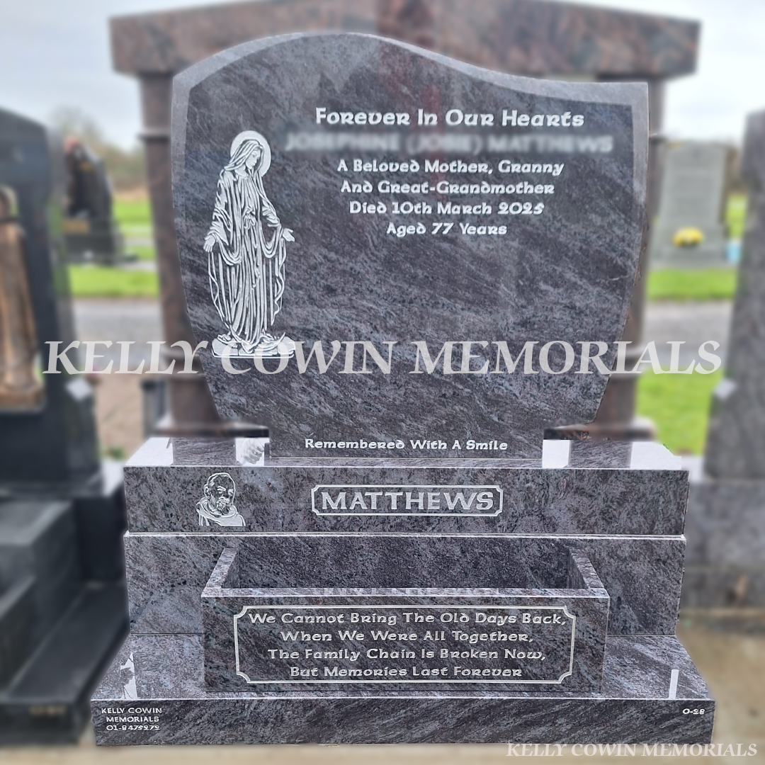 Blue Lagoon C1 headstone with silver inscription and Our Lady engraving in Dardistown Cemetery Dublin