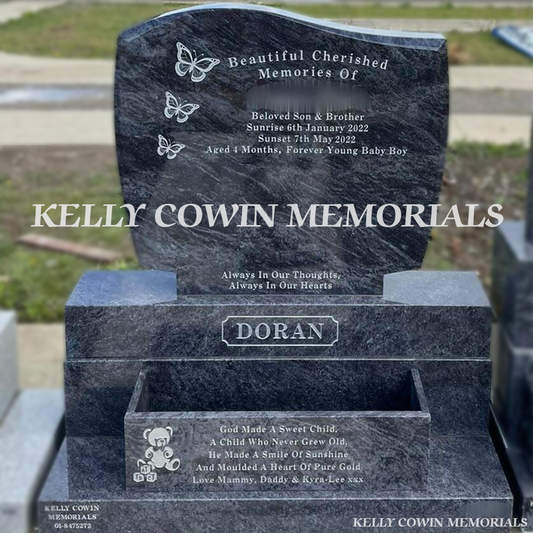 Front view of Blue Lagoon C1 headstone with silver inscription in Balgriffin Cemetery Dublin