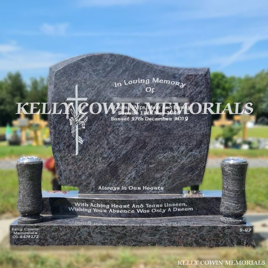 Front view of Blue Lagoon C1 headstone with silver inscription and tall granite vases in Newlands Cross Cemetery Dublin