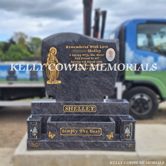 Front view of Blue Lagoon C1 headstone with gold engraving in Balgriffin Cemetery