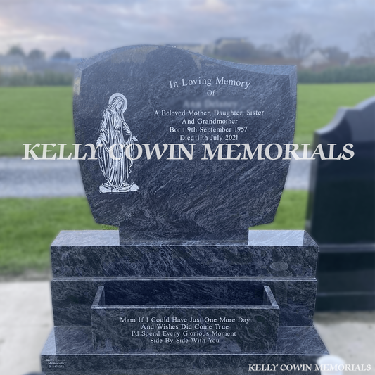 Front view of Blue Lagoon C1 headstone with silver inscription and flower box in Dardistown Cemetery Dublin