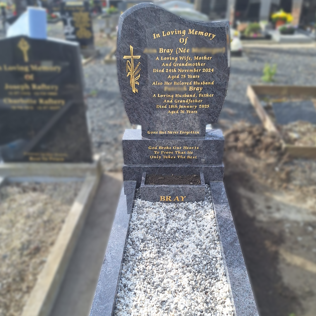 Front view of Blue Lagoon C1 headstone with gold inscription in Mount Jerome Cemetery
