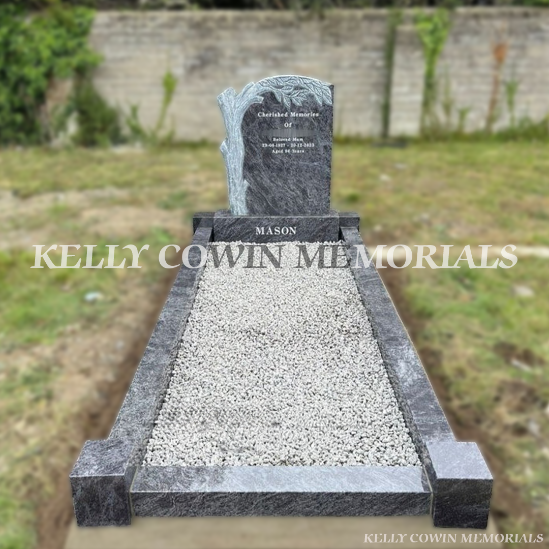 “Blue Lagoon carved tree headstone on granite base with full kerbing installed in Esker Cemetery Dublin by Kelly Cowin Memorials”