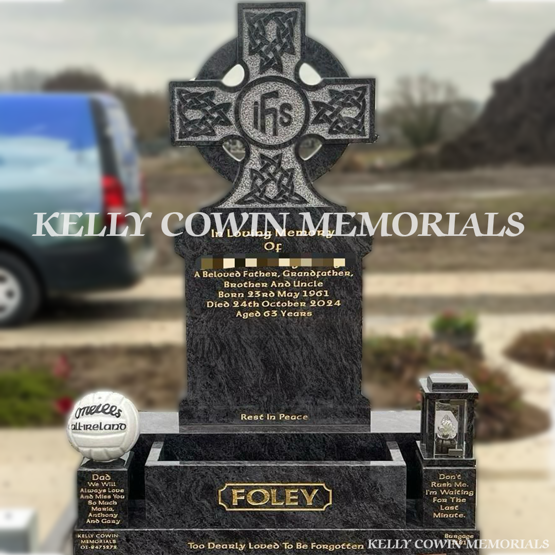 Front view of Blue Lagoon granite Celtic Cross headstone with gold inscription and flower box in Balgriffin Cemetery Dublin