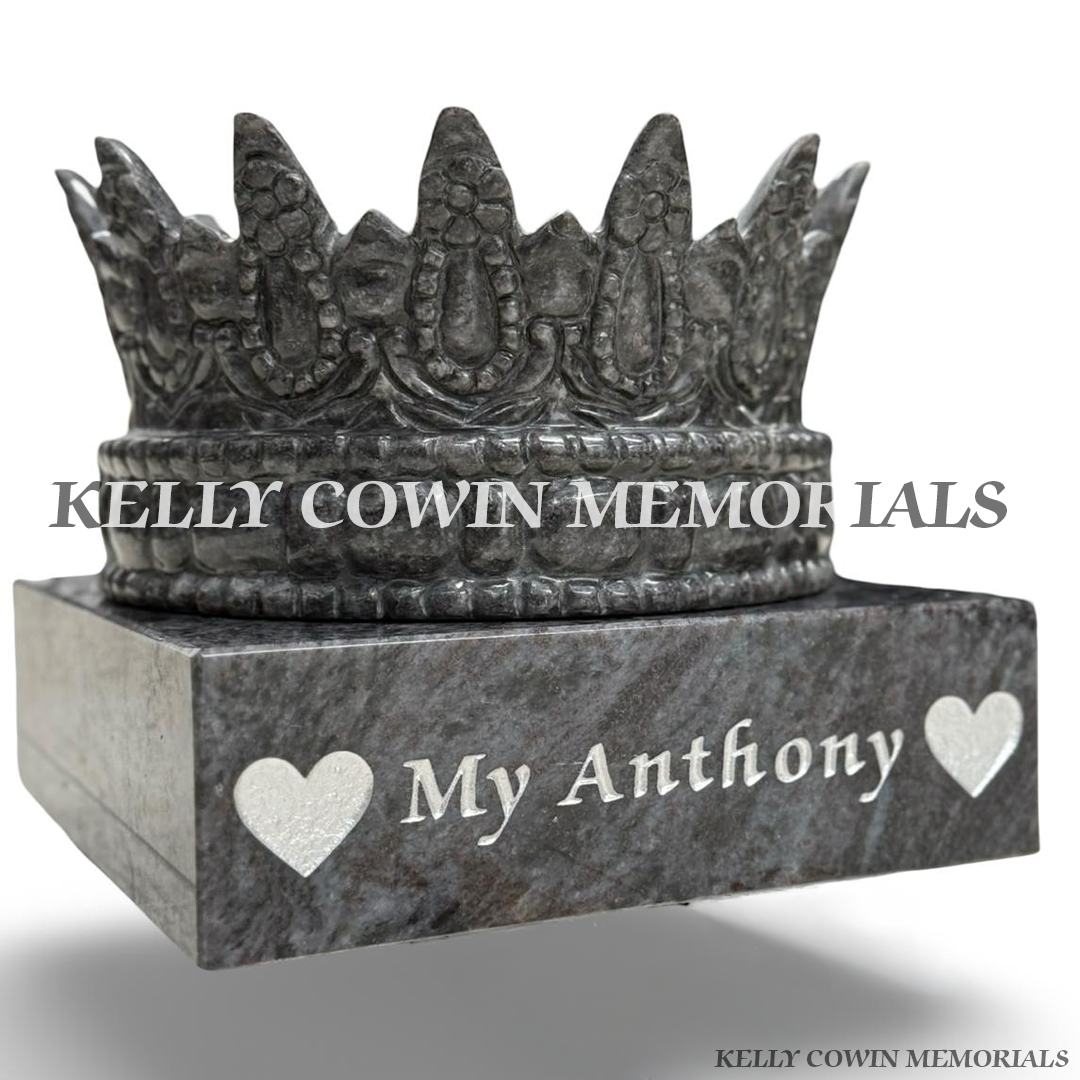 Blue Lagoon granite crown memorial ornament on polished square plinth.