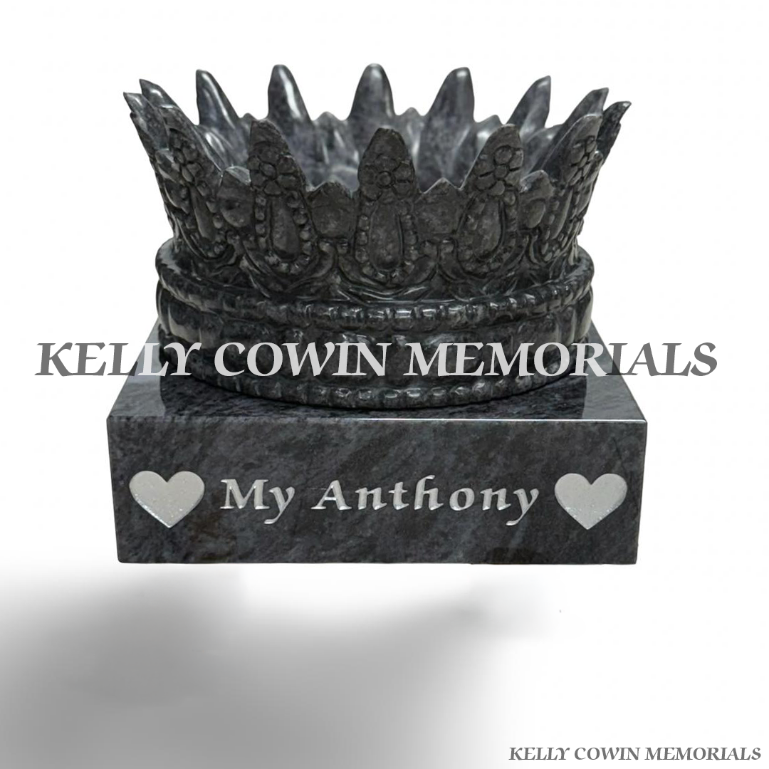 Personalised Blue Lagoon granite crown with silver engraved name and hearts.