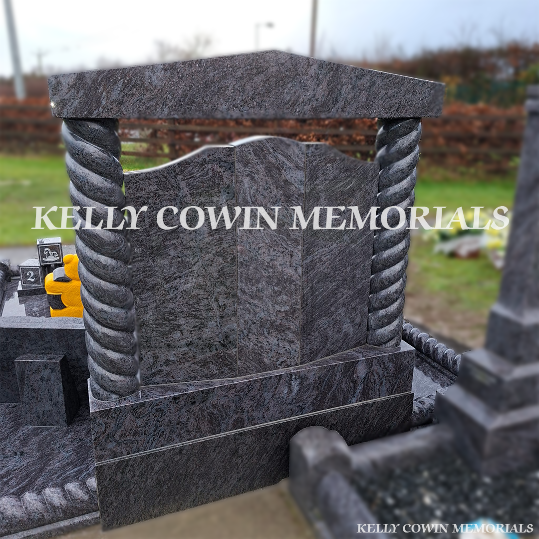 Back view of Blue Lagoon granite Gates of Heaven headstone with full grave surround, granite floor, memorial bench and corner posts in a Tipperary cemetery