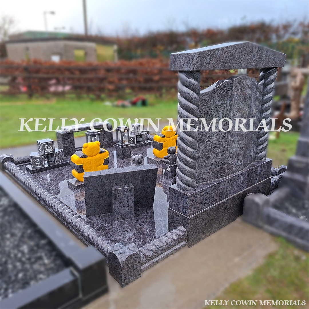 Back view of Blue Lagoon granite Gates of Heaven headstone with full grave surround, granite floor, memorial bench and corner posts in a Tipperary cemetery