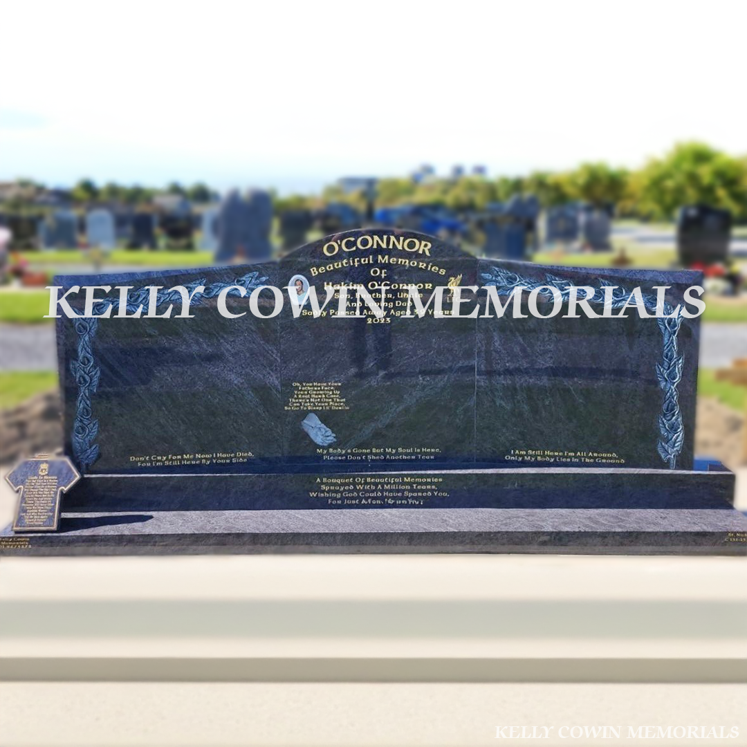 Front view of custom Blue Lagoon granite headstone with gold inscription and laser-etched hands image in Dardistown Cemetery Dublin